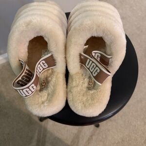 Women’s cream Ugg slides